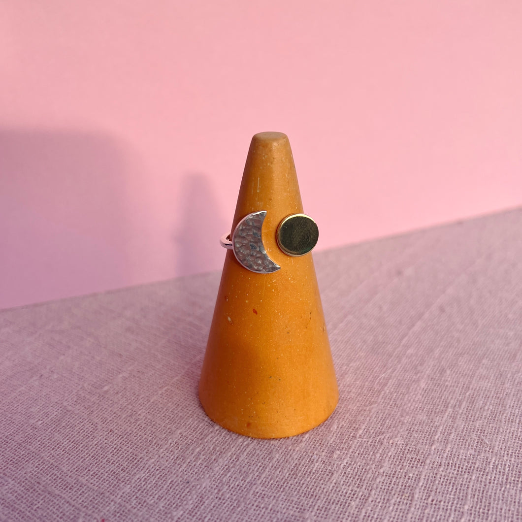 Sun and moon ring on orange cone 