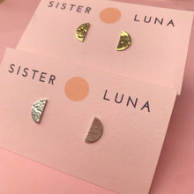 Load image into Gallery viewer, Brass and silver half moon studs on earring cards
